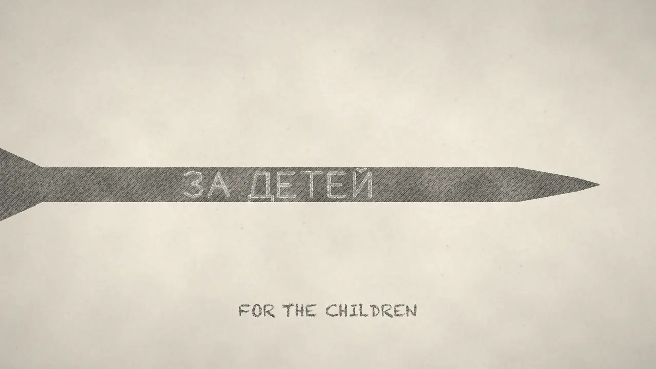 Film still: a grey missile shape with ЗА ДЕТЕЙ written on it in chalk.